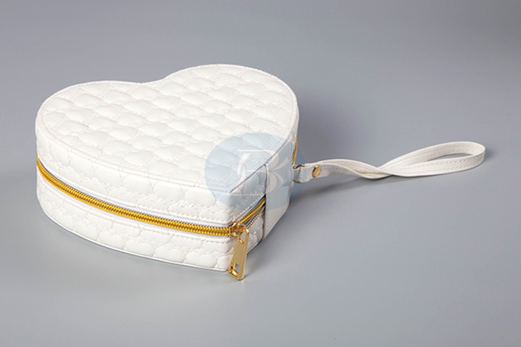 heart-shaped tall white jewelry box